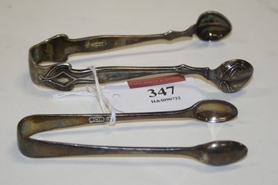 Lot 347 - A pair of Edward VII silver sugar nips,...