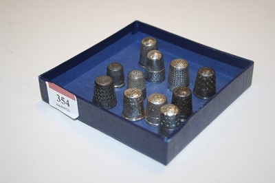 Lot 354 - A collection of eleven silver and white metal...