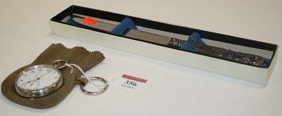 Lot 356 - A silver handled cake knife; together with a...