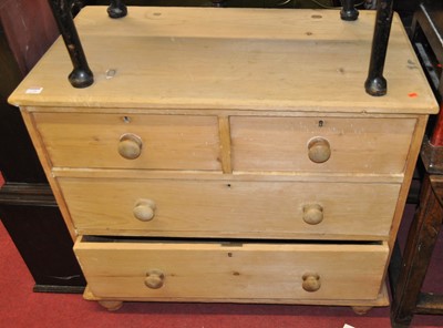 Lot 1248 - A rustic pine chest of two short over two long...