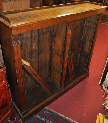 Lot 1253 - A late Victorian oak three-quarter gallery...