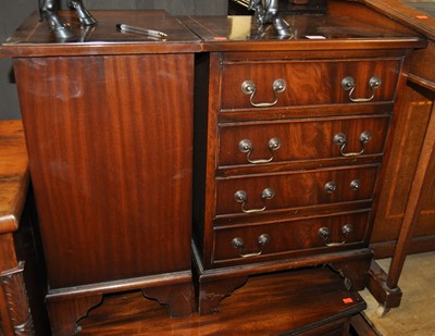 Lot 1258 - A pair of reproduction mahogany four drawer...
