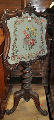 Lot 1261 - A mid-Victorian mahogany floral carved and...