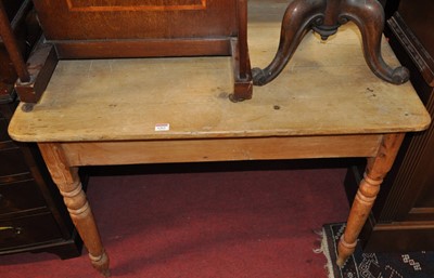 Lot 1262 - A small Victorian pine round cornered single...