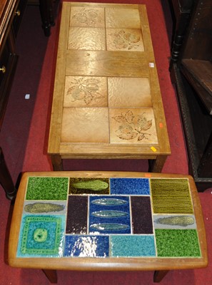 Lot 1269 - A 1970s teak and tile top inset two-tier low...