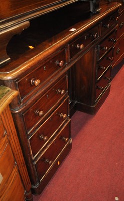 Lot 1276 - A Victorian mahogany round cornered kneehole...