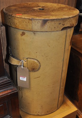 Lot 1279 - A stitched pale leather cylindrical laundry...