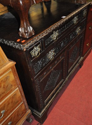 Lot 1284 - A late 19th century floral relief carved oak...