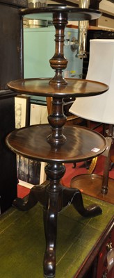 Lot 1286 - A contemporary mahogany circular three-tier...