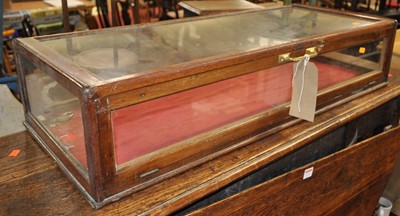 Lot 1291 - A late Victorian mahogany and glazed table-top...