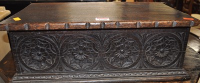 Lot 1298 - A Victorian floral relief carved oak hinge...