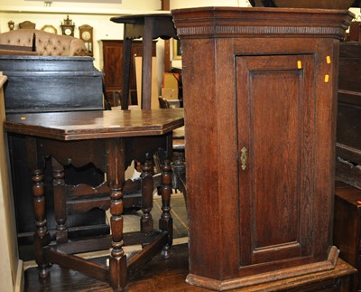 Lot 1299 - A joined oak fold-over single gateleg low...