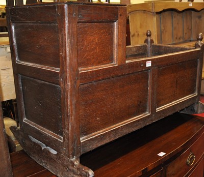 Lot 1301 - An 18th century joined and panelled oak baby's...