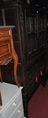 Lot 1315 - An antique joined and heavily floral relief...