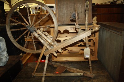 Lot 1318 - A pine and beech spinning wheel