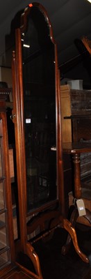 Lot 1328 - A contemporary mahogany arch topped bevelled...