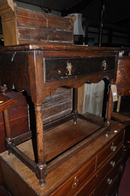Lot 1332 - A joined oak plank topped single drawer side...