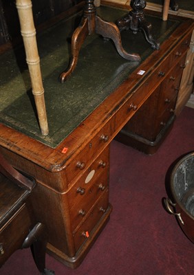 Lot 1340 - A mid-Victorian oak and gilt tooled green...