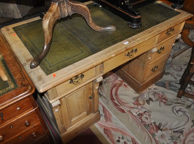 Lot 1345 - A rustic pine twin pedestal kneehole writing...