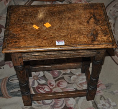 Lot 1346 - A joined oak joint stool, raised on turned and...