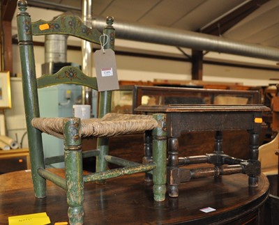 Lot 1349 - A child's green painted and rush seat...