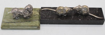 Lot 451 - A pair of white metal models of mice, each...