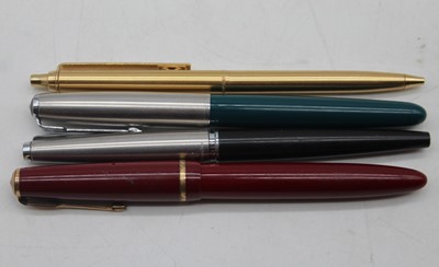 Lot 454 - Three Parker fountain pens; together with a...