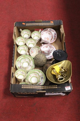 Lot 659 - A Rockingham style part tea service on a white...
