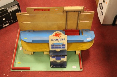 Lot 671 - A 1960s painted model garage forecourt, with...