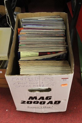 Lot 672 - A box of assorted comics to include Marvel...