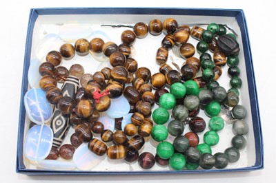 Lot 475 - Various beaded necklaces, to include tigers...