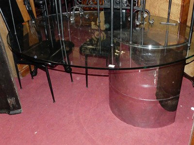 Lot 1363 - A 1970s heavy glass oval topped breakfast...