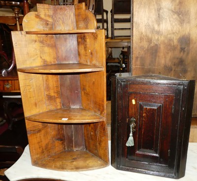 Lot 1366 - A rustic stained pine open four tier corner...