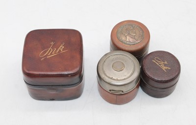 Lot 480 - An early 20th century tan leather clad brass...