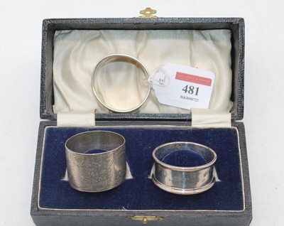 Lot 481 - Three silver napkin rings, housed in...
