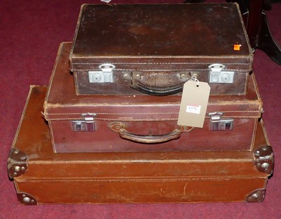 Lot 1375 - Three various sized stitched tan leather...