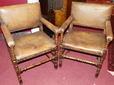 Lot 1378 - A set of eight joined oak tan leather pad back...