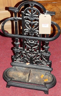 Lot 1382 - A Victorian style black painted cast iron...