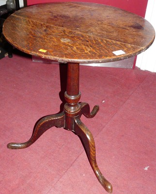 Lot 1388 - An early 19th century provincial oak circular...