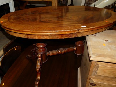 Lot 1401 - A flame mahogany and crossbanded oval low...
