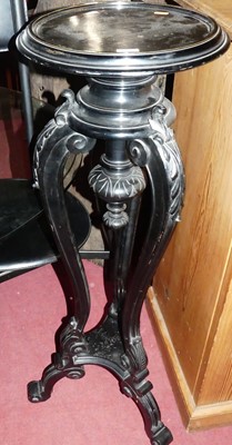 Lot 1406 - A circa 1900 floral carved and ebonised...