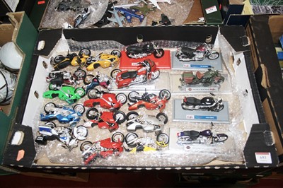 Lot 693 - A collection of scale model motorcycles to...
