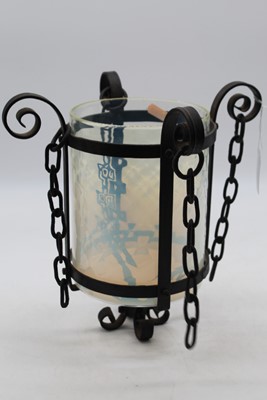 Lot 604 - An Arts & Crafts style wrought iron framed...