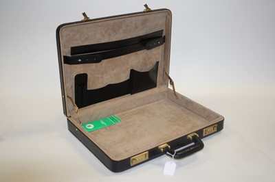 Lot 616 - A leather attache case with combination lock