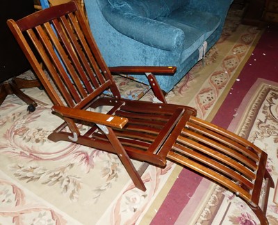 Lot 1411 - A contemporary slatted teak folding steamer...