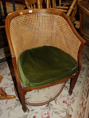 Lot 1416 - A pair of early 20th century mahogany and cane...