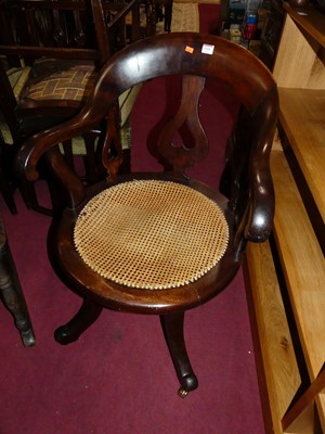 Lot 1430 - A mid-Victorian mahogany splat back tub elbow...