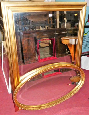 Lot 1082 - A reproduction gilt framed and bevelled...