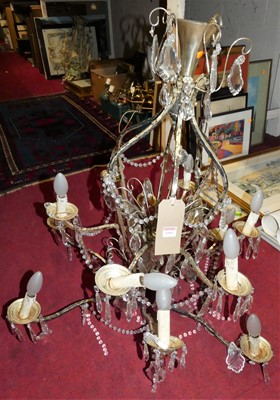 Lot 1085 - A reproduction silvered metal two-tier...
