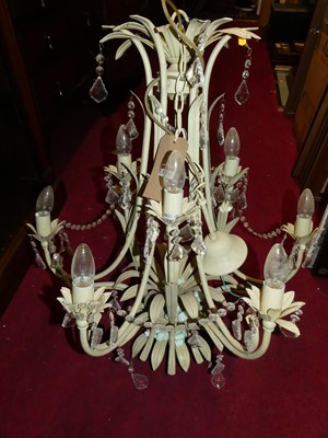 Lot 1093 - A reproduction whitewashed metal two-tier nine-...